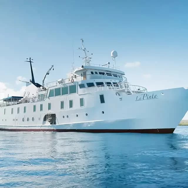 La Pinta, a 48-guest Galapagos expedition ship, underway on calm blue water